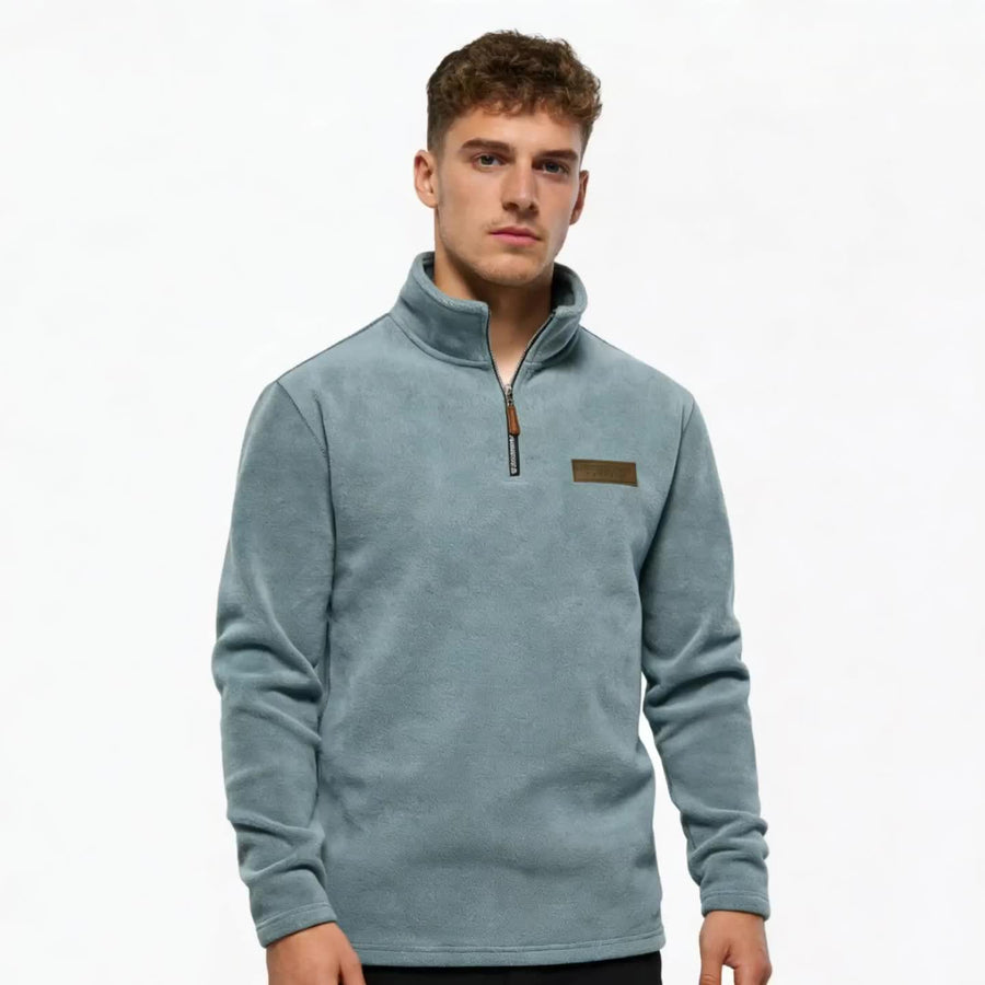 Heren trui met kwart rits – moderne casual stijl met opstaande kraag en subtiel logo