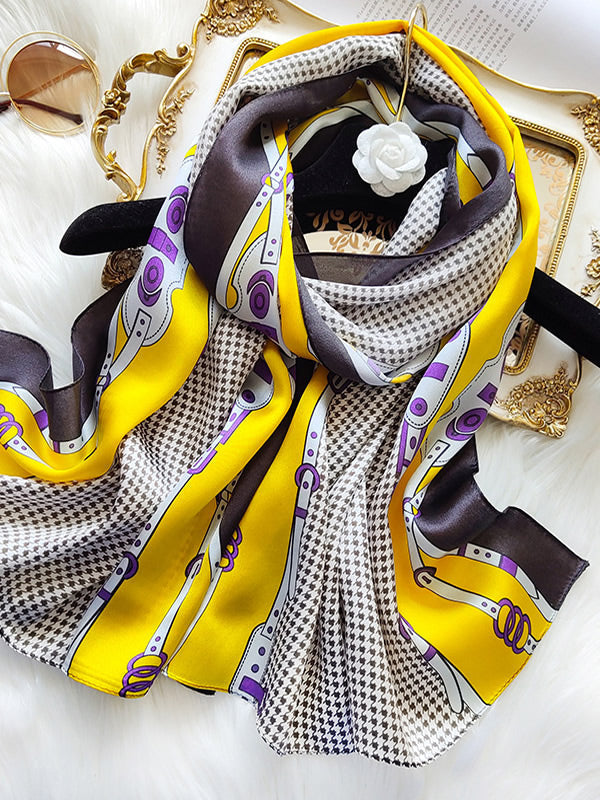 Dameshalsdoek met kettingmotief en kwastjesdetails in verschillende kleuren