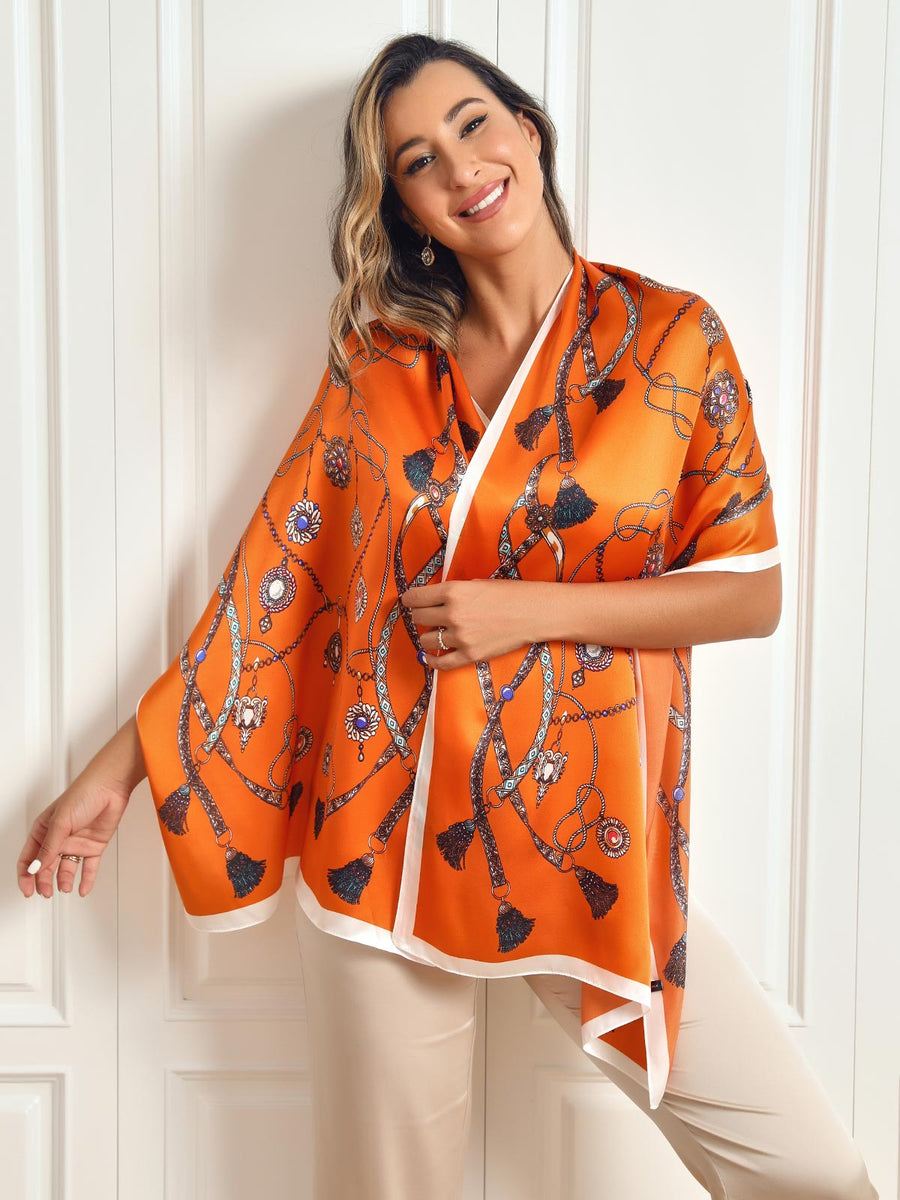 Dameshalsdoek met kettingmotief en kwastjesdetails in verschillende kleuren