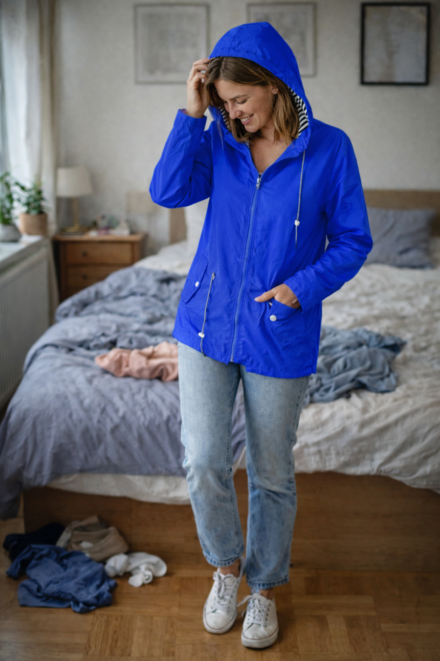 Damen Regenjacke mit Kapuze und Reißverschluss, einfarbig