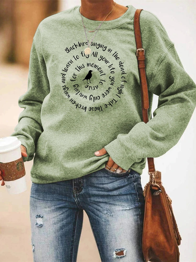 Damessweatshirt met ronde hals, lange mouwen, tekst en kraaiprint