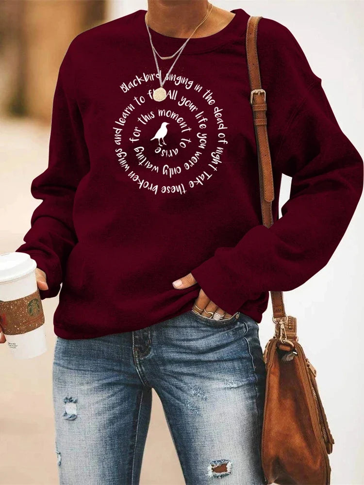 Damessweatshirt met ronde hals, lange mouwen, tekst en kraaiprint