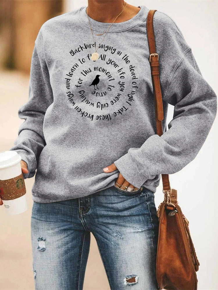 Damessweatshirt met ronde hals, lange mouwen, tekst en kraaiprint