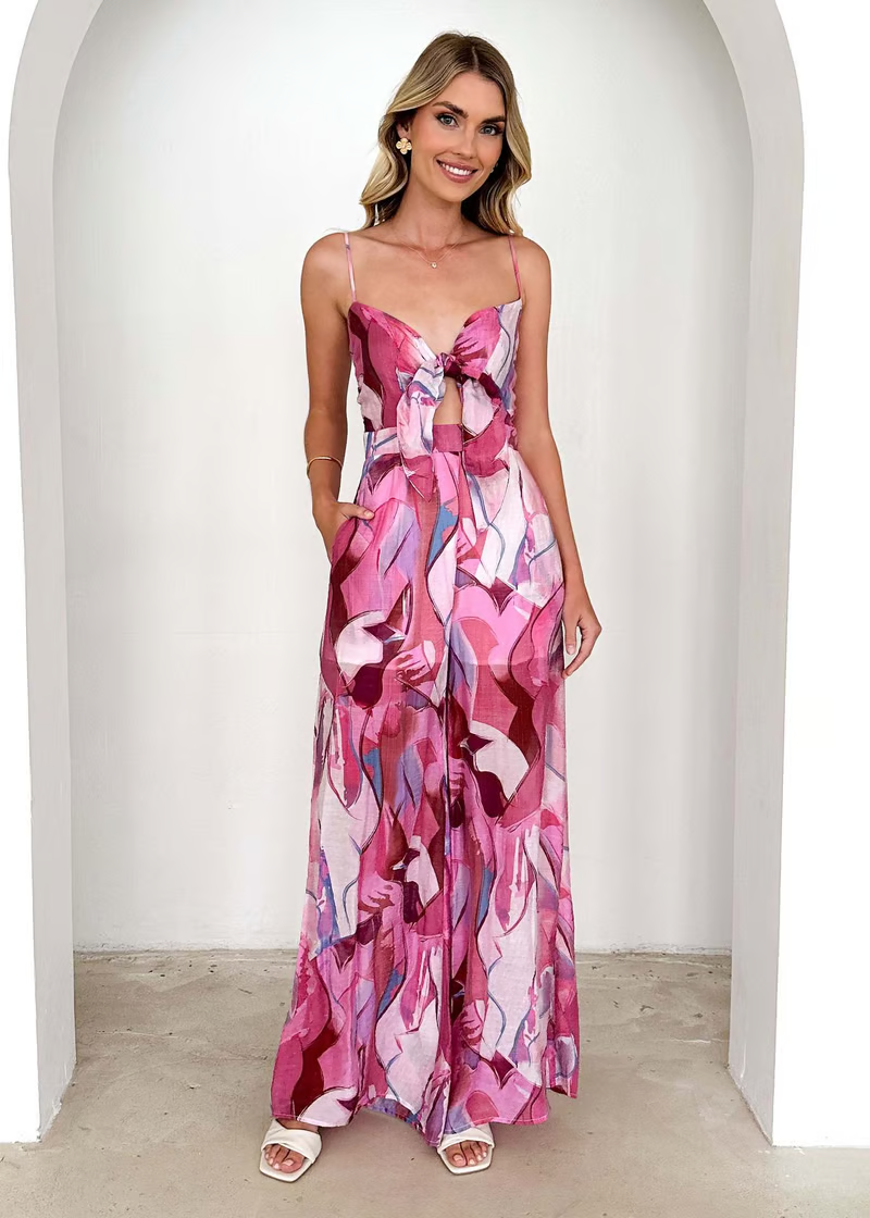 Damesjumpsuit met wijde pijpen, bustier en groen bladpatroon