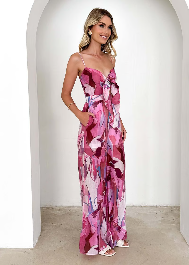 Damesjumpsuit met wijde pijpen, bustier en groen bladpatroon