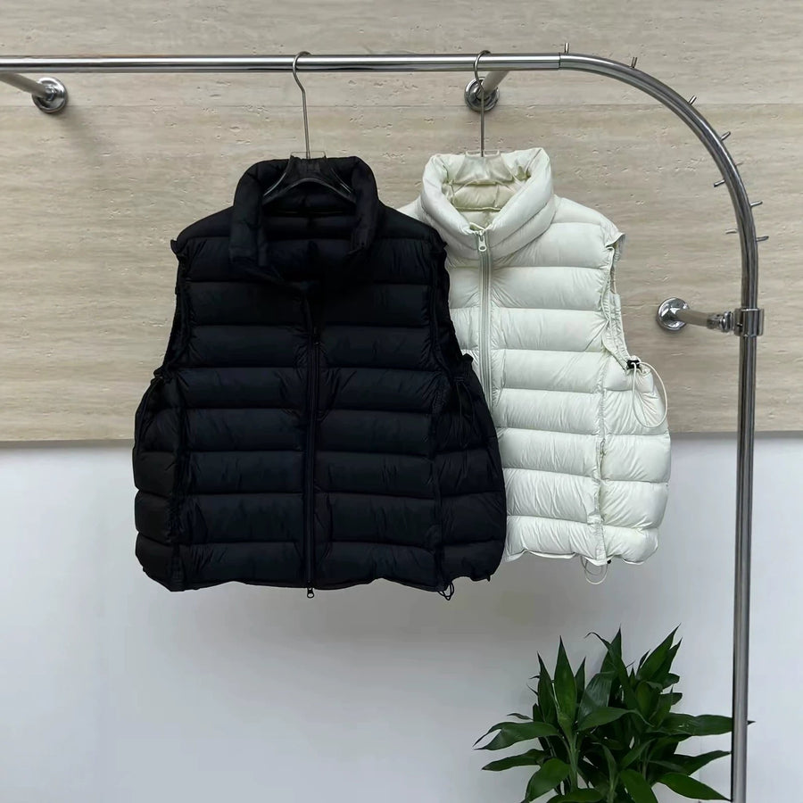 Uniseks gewatteerde bodywarmer met opstaande kraag, mouwloos model met ritssluiting