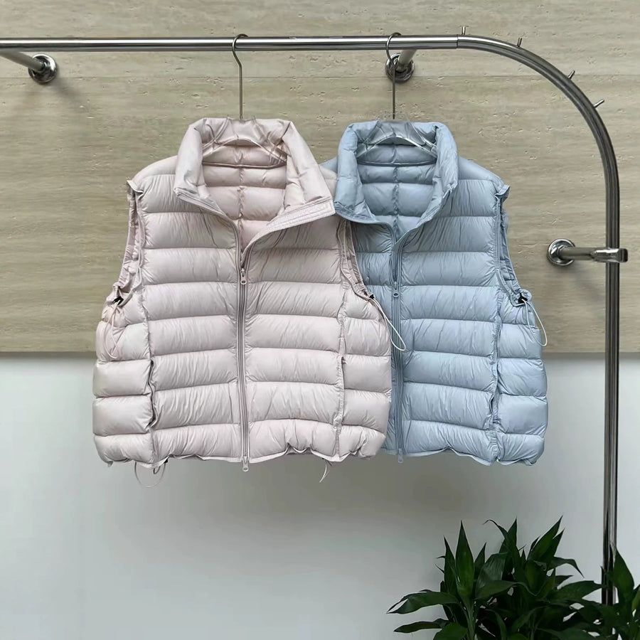 Uniseks gewatteerde bodywarmer met opstaande kraag, mouwloos model met ritssluiting