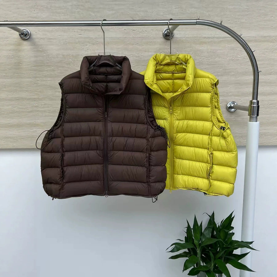 Uniseks gewatteerde bodywarmer met opstaande kraag, mouwloos model met ritssluiting