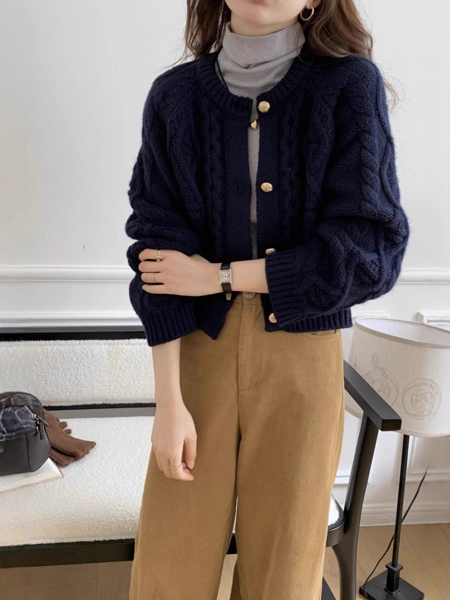 Damesvest met kabelpatroon en goudkleurige knopen, marineblauw