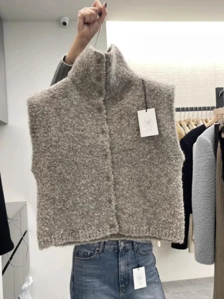 Damesgebreid vest met opstaande kraag en knopenlijst