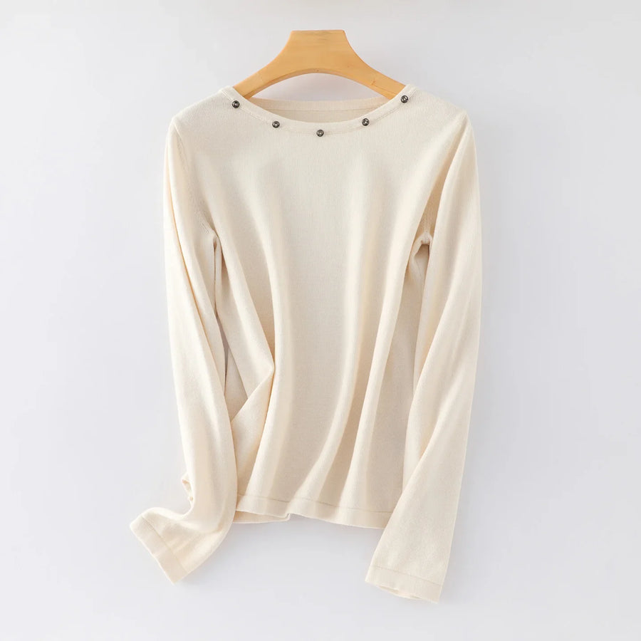 Damesshirt met lange mouwen, ronde hals en sierknopen