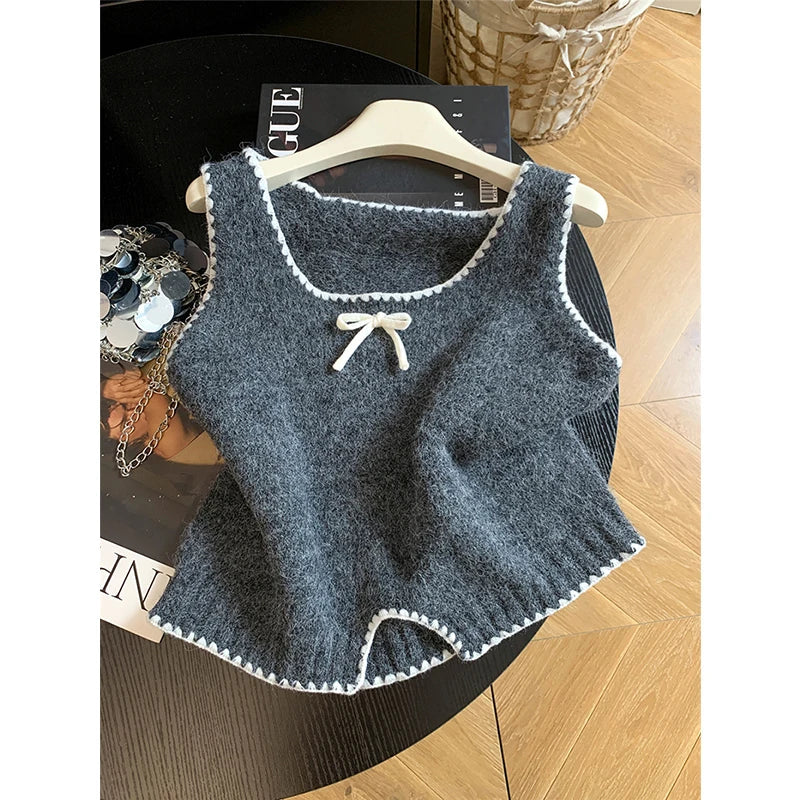Damen Strickweste Ärmellos mit Schleife und Wellenkante