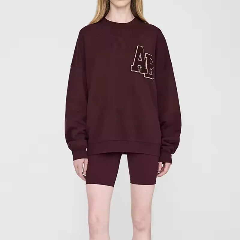 Grijs oversized damessweatshirt met ronde hals en logo-applicatie