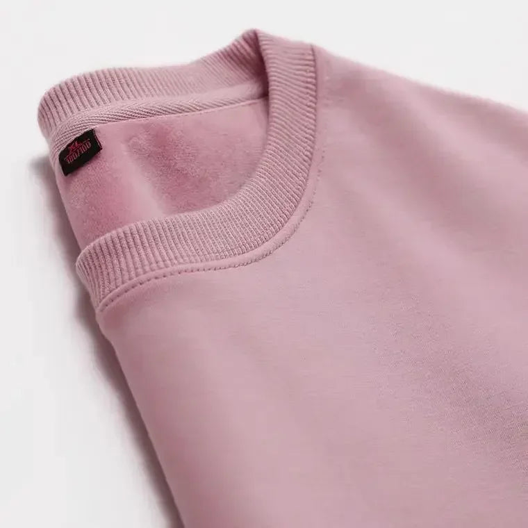 Unisex sweatshirt met lange mouwen, zachte binnenvoering, ronde hals en geribde boorden