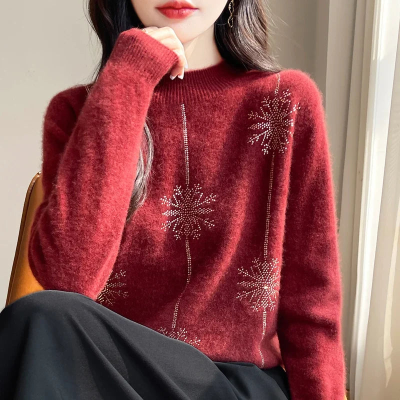Damespullover in rood met glitterbloemenpatroon en opstaande kraag