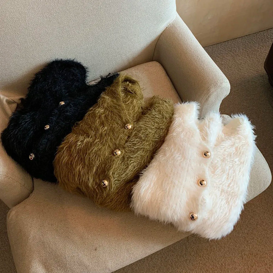 Kort fluffy damesvest met V-hals en knopenlijst, lichtblauw