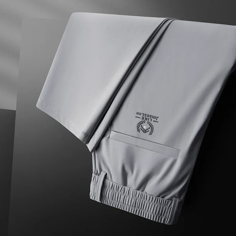 Vrijetijdsbroek voor heren met elastische tailleband en zak met rits