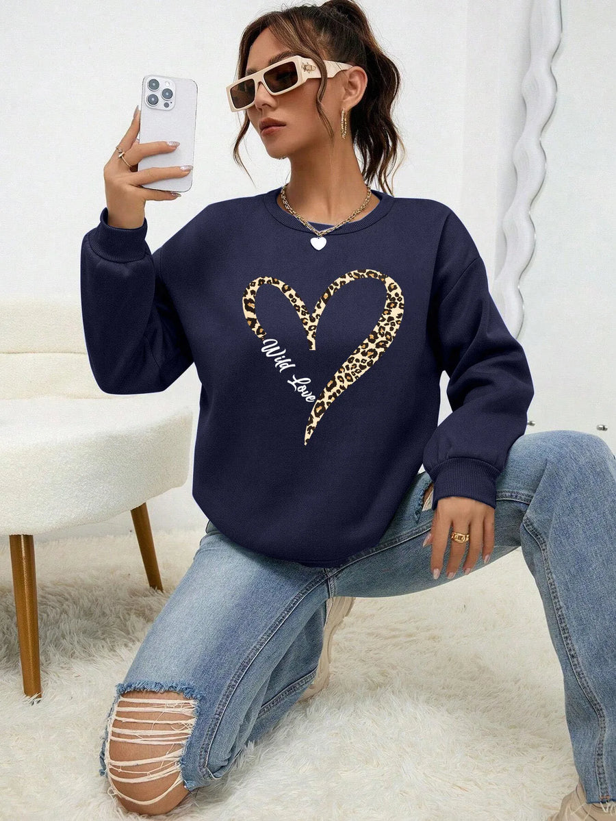 Dames sweatshirt met ronde hals en luipaard-hartprint