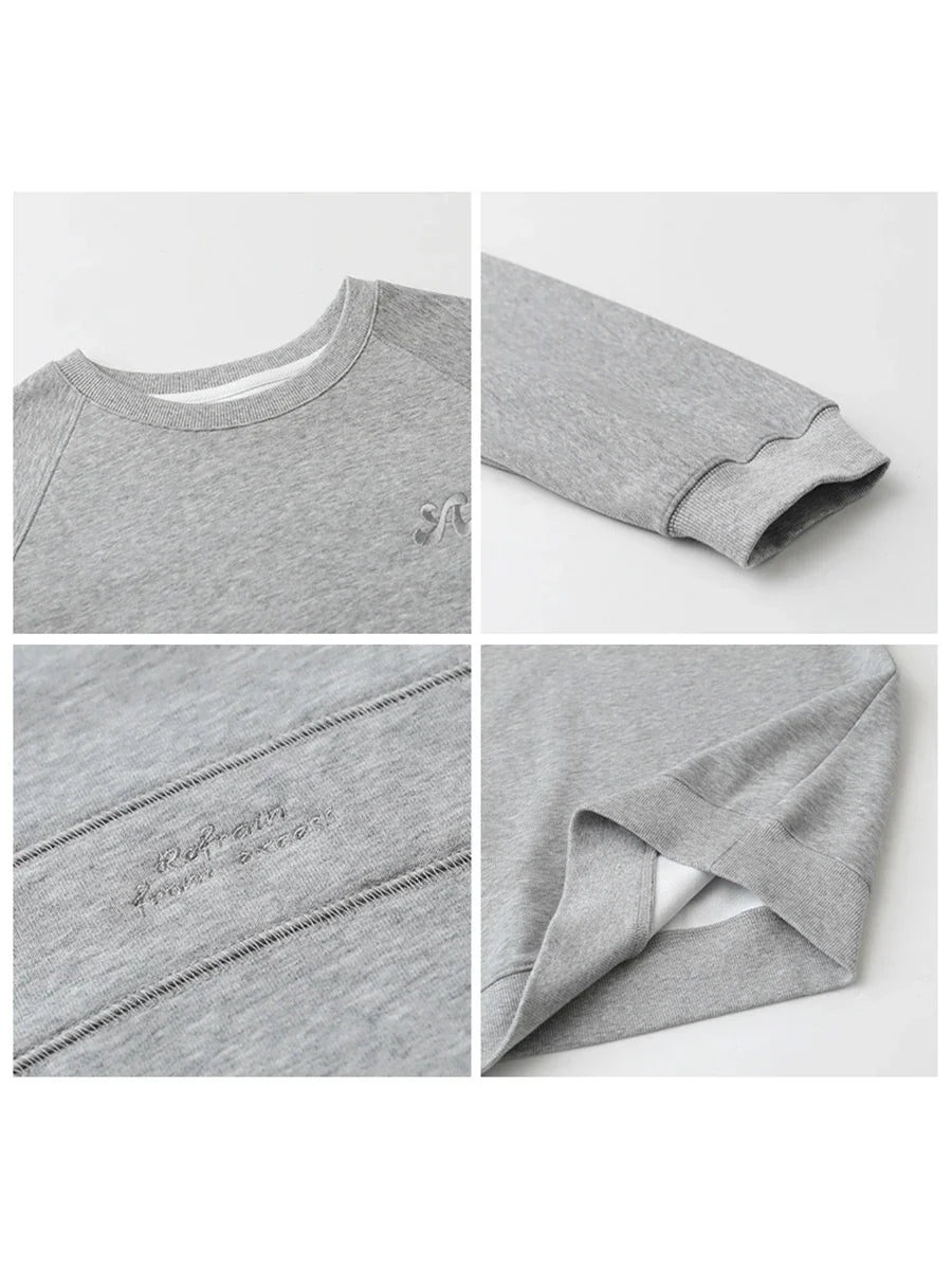 Dames sweatshirt met ronde hals en lange mouwen, met turquoise borduursel