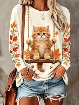 Damen Langarmshirt mit Katzenmotiv auf Schaukel und Herbstlaub