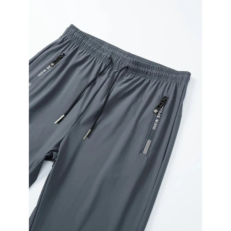 Grijze vrijetijdsbroek voor heren met zakken met rits en trekkoord