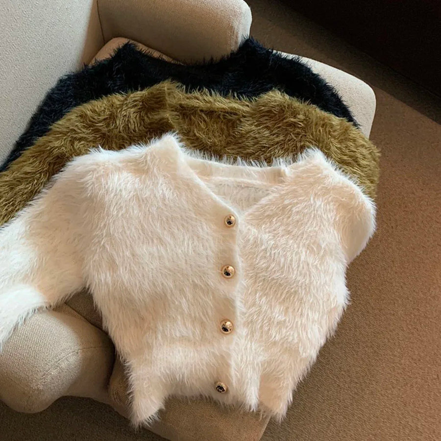 Kort fluffy damesvest met V-hals en knopenlijst, lichtblauw