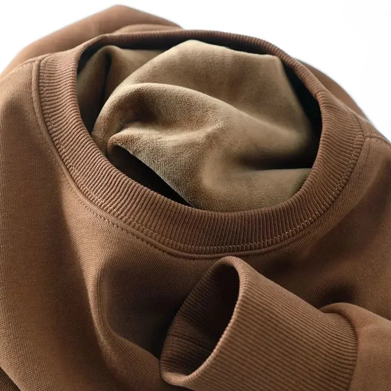 Unisex sweatshirt met lange mouwen, zachte binnenvoering, ronde hals en geribde boorden