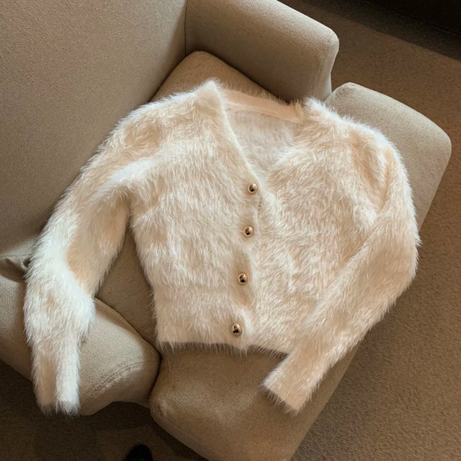Kort fluffy damesvest met V-hals en knopenlijst, lichtblauw
