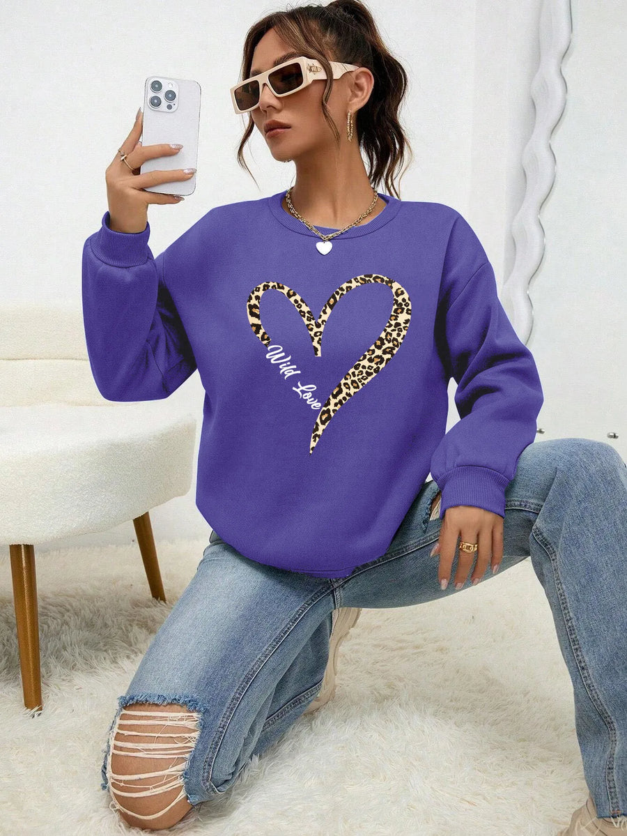Dames sweatshirt met ronde hals en luipaard-hartprint