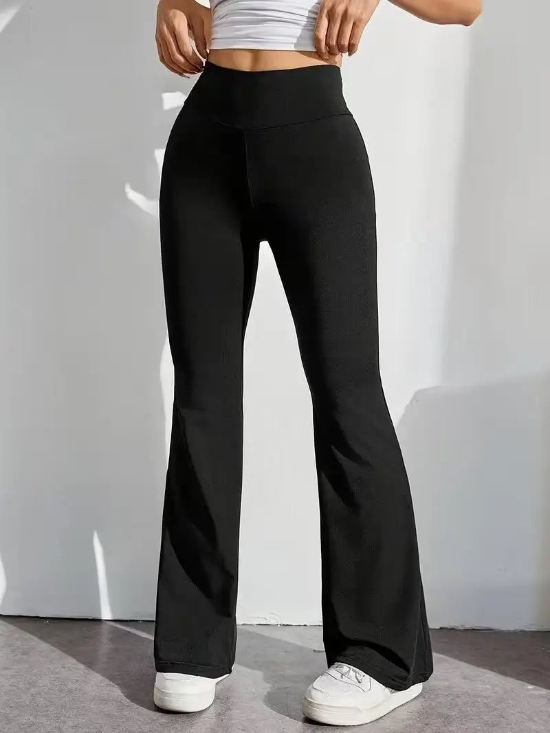 Zwarte dameslegging met uitlopende pijpen en hoge taille