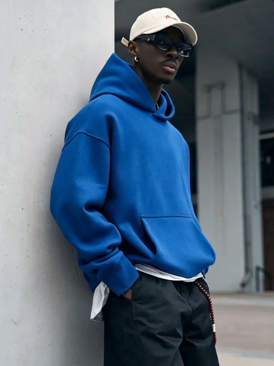 Unisex oversized hoodie met capuchon en kangoeroezak