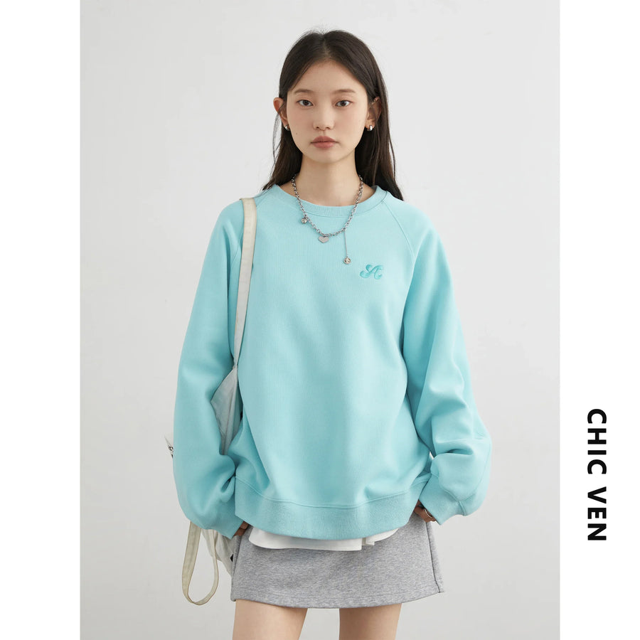 Dames sweatshirt met ronde hals en lange mouwen, met turquoise borduursel