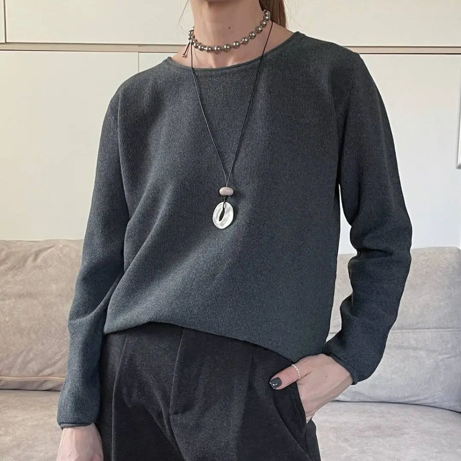 Dames trui met ronde hals, lange mouwen en gebreide look