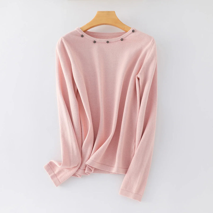 Damesshirt met lange mouwen, ronde hals en sierknopen