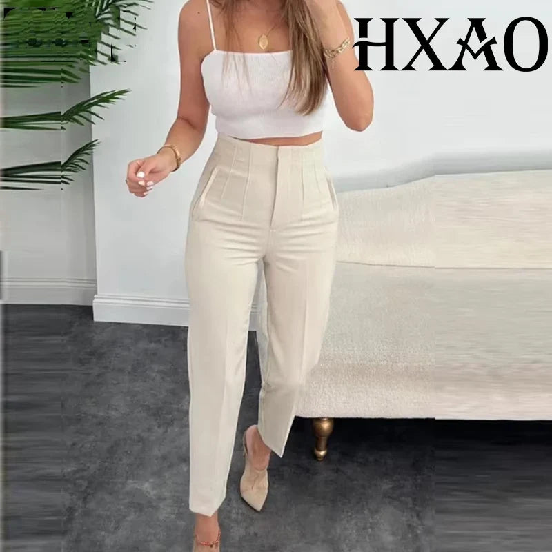 Damesbroek van stof met hoge taille in wortelmodel