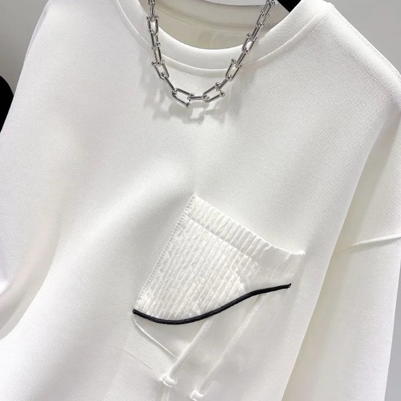 Unisex sweatshirt met lange mouwen, ronde hals en asymmetrische zoom