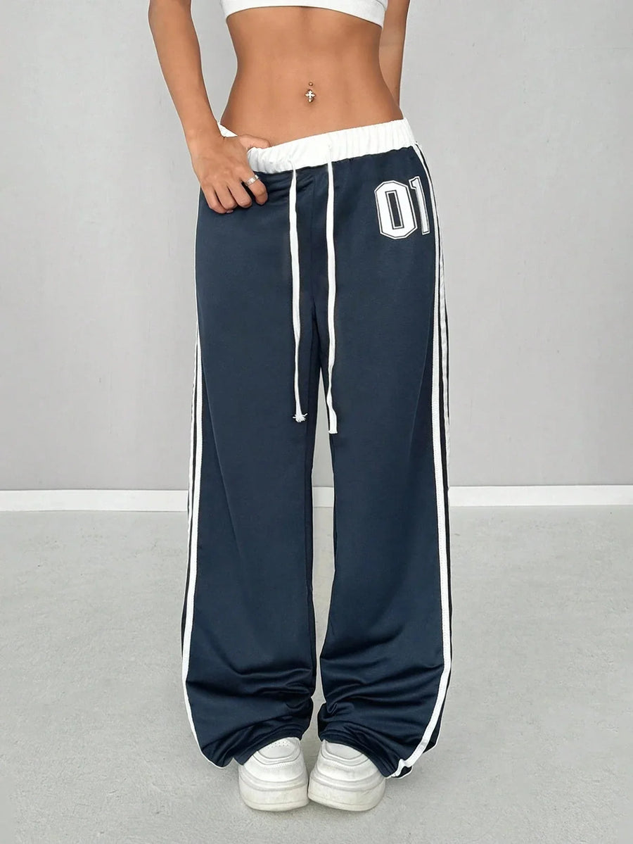 Wide-leg-joggingbroek voor dames met zijstrepen en cijferprint
