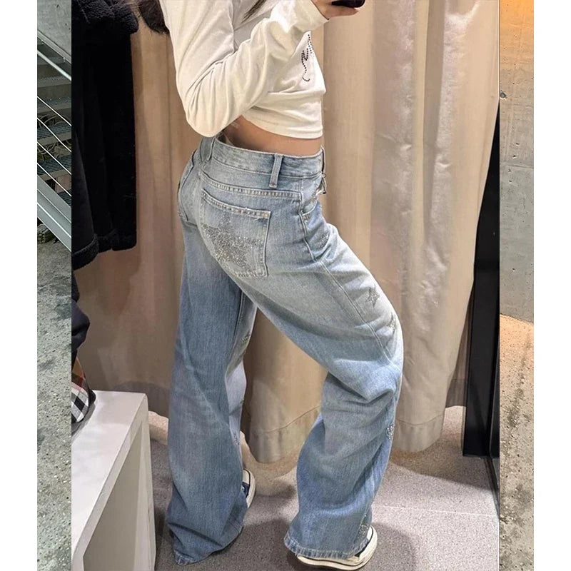 Lichtblauwe damesjeans met wijde pijpen, sterren, glitter en straight fit