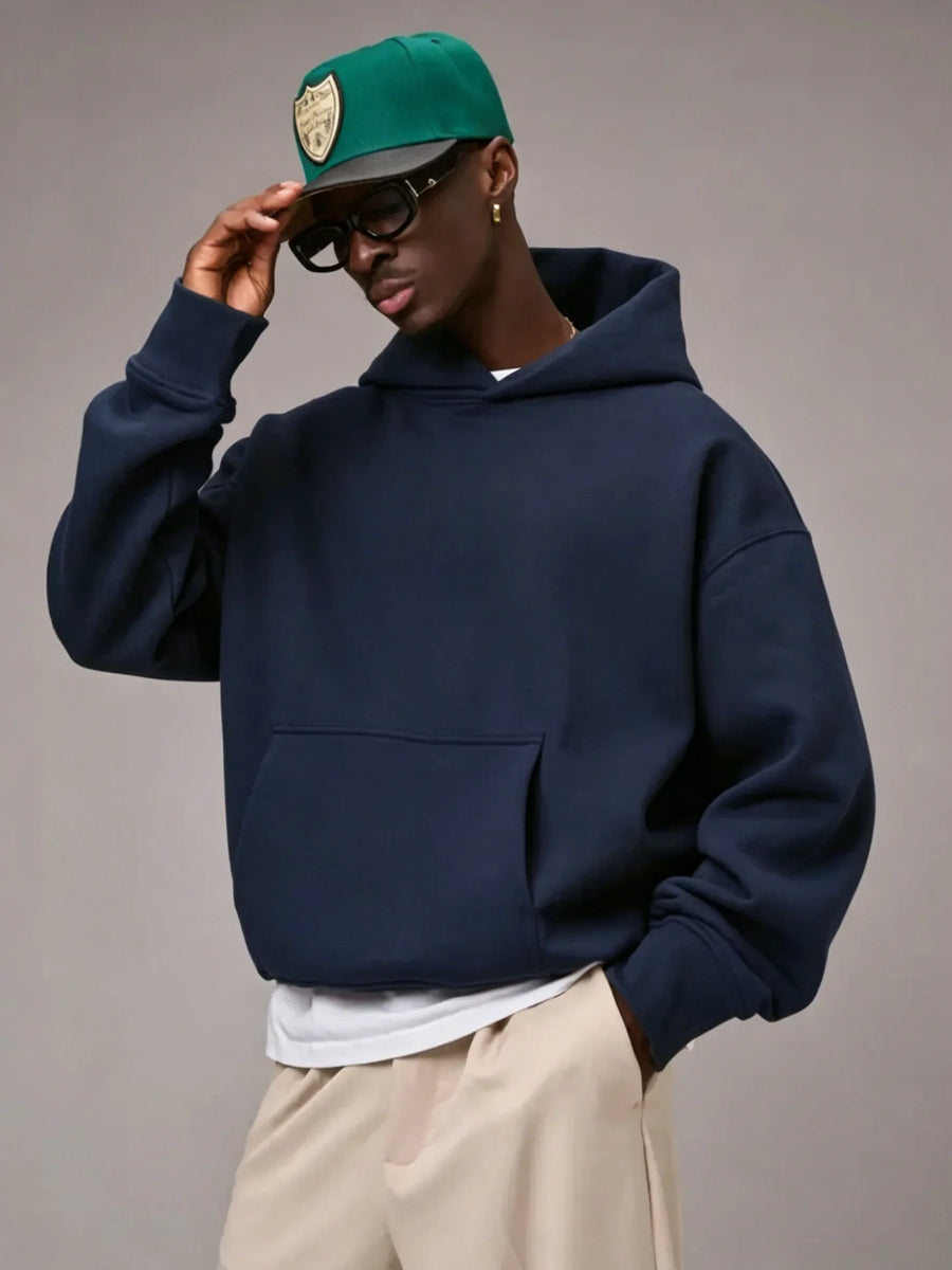 Unisex oversized hoodie met capuchon en kangoeroezak