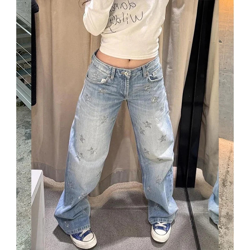 Lichtblauwe damesjeans met wijde pijpen, sterren, glitter en straight fit