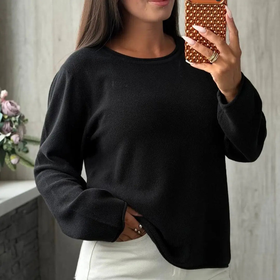 Dames trui met ronde hals, lange mouwen en gebreide look