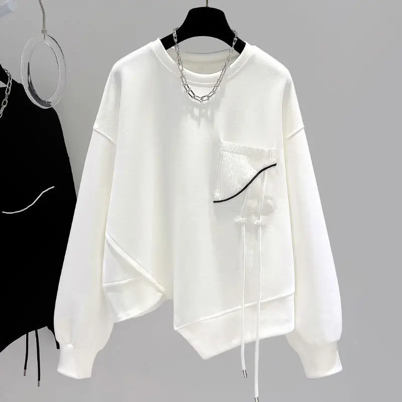 Unisex sweatshirt met lange mouwen, ronde hals en asymmetrische zoom
