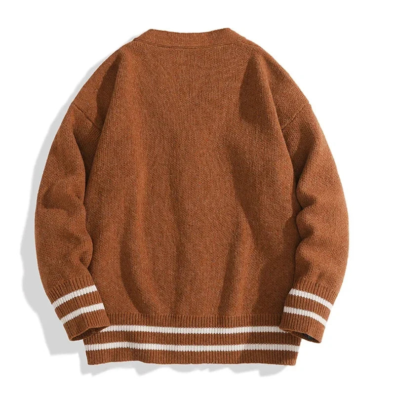 Unisex gebreid vest met V-hals, knoopsluiting en gestreepte mouwen