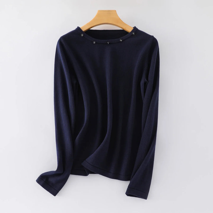Damesshirt met lange mouwen, ronde hals en sierknopen