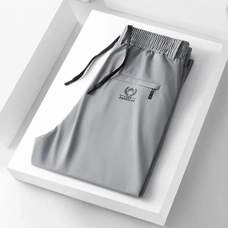 Vrijetijdsbroek voor heren met elastische tailleband en zak met rits