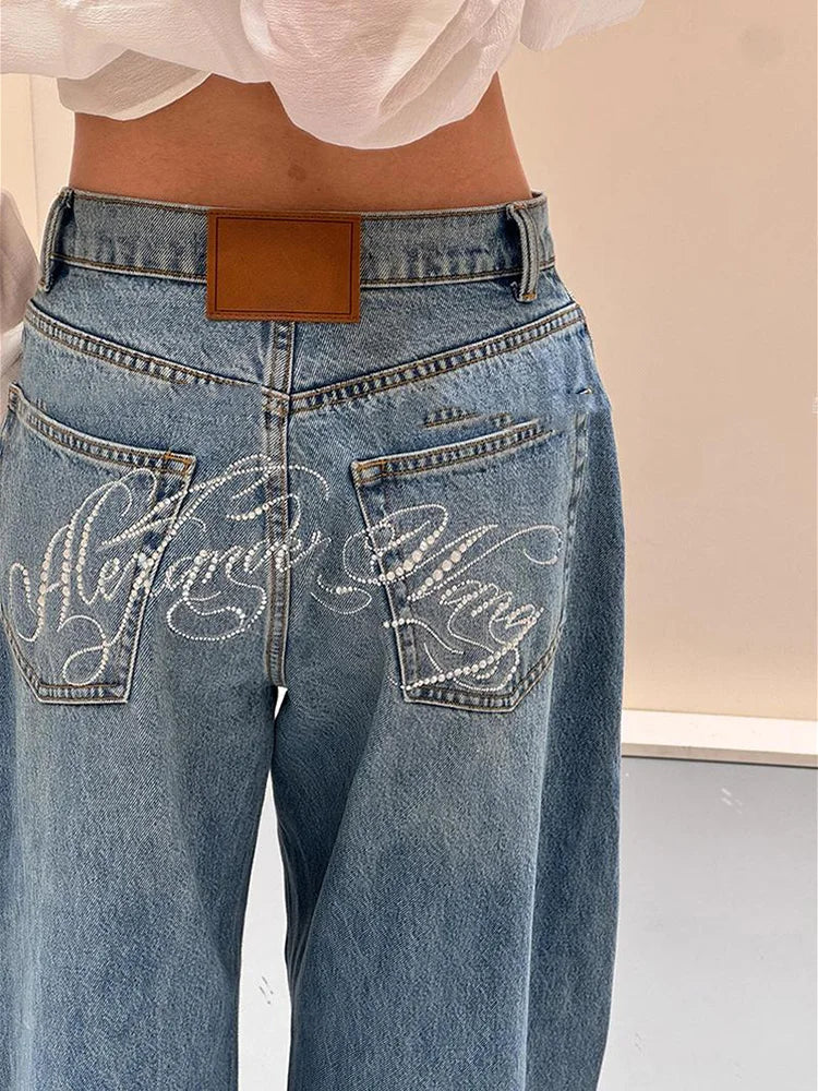 Damen Jeans Weites Bein Hellblau mit Verzierungen auf Gesäßtaschen