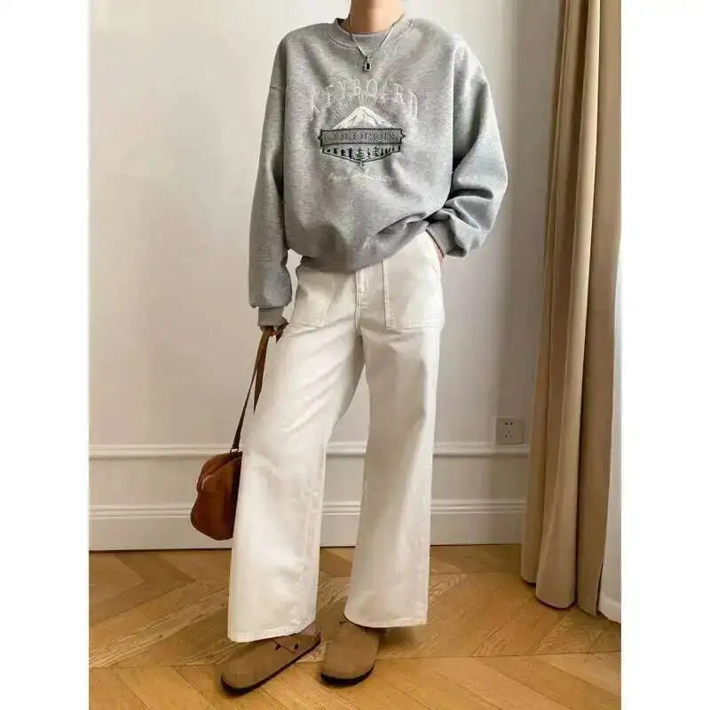 Unisex Langarm Sweatshirt mit Rundhalsausschnitt und Stickerei Motiv