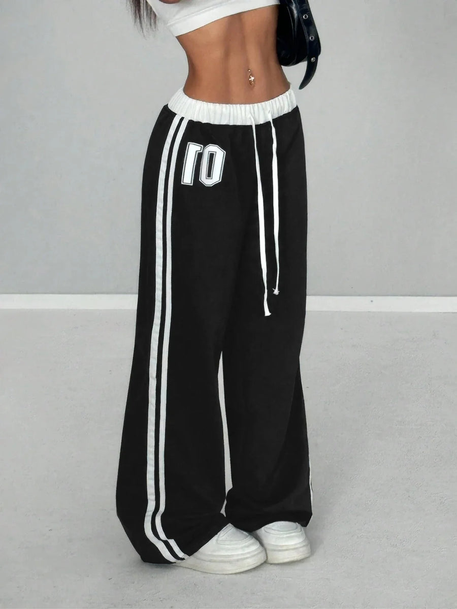 Wide-leg-joggingbroek voor dames met zijstrepen en cijferprint