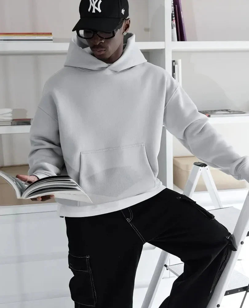 Unisex oversized hoodie met capuchon en kangoeroezak