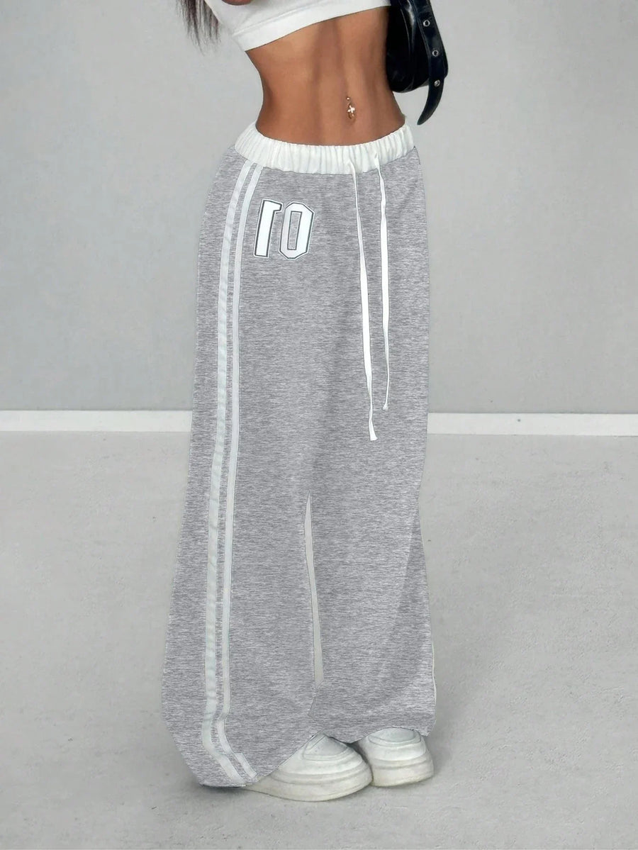 Wide-leg-joggingbroek voor dames met zijstrepen en cijferprint